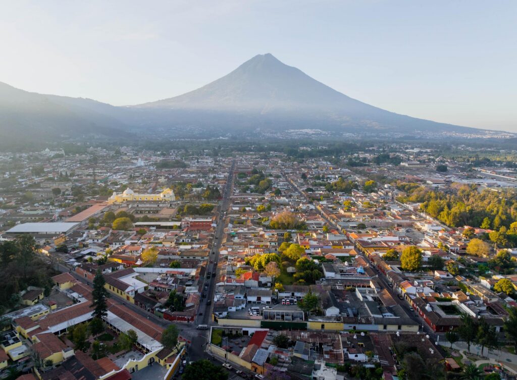Aerial Panorama of Antigua, Guatemala with Volcan de Agua in background.