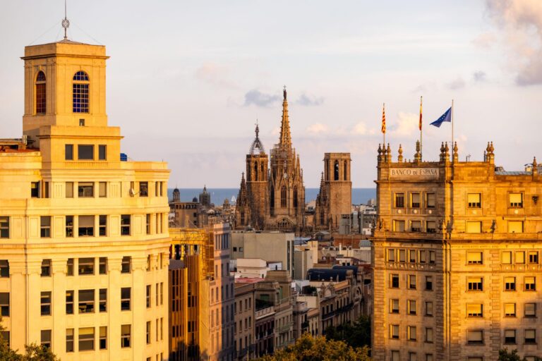 Barcelona skyline at sunset in Catalonia, Spain.