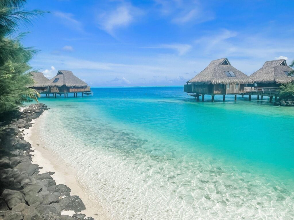 Overwater bungalows in Bora Bora, South Pacific lagoon.