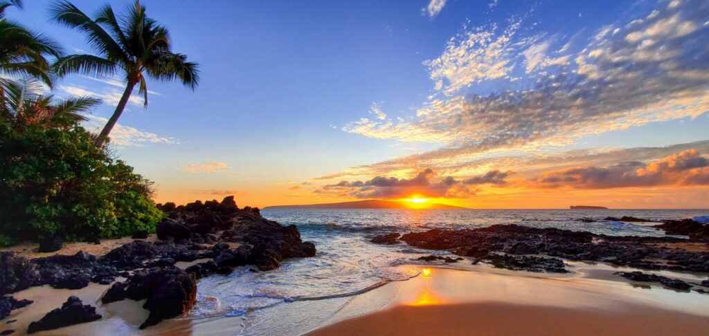 Secret beach sunset in Maui, Hawaii.