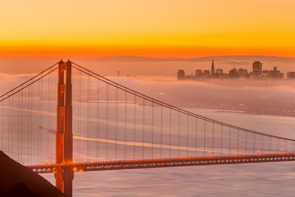 San Francisco Downtown and Golden Gate Bridge at Sunrise.