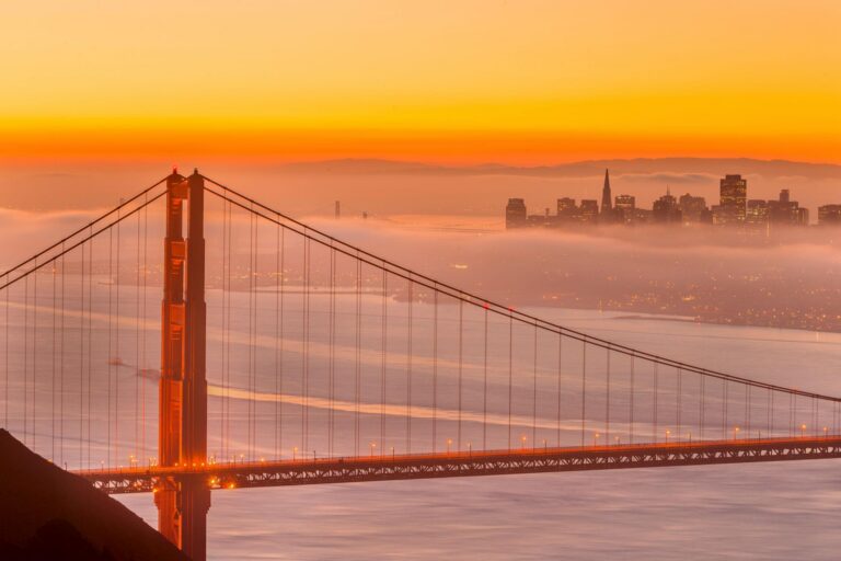 San Francisco Downtown and Golden Gate Bridge at Sunrise.