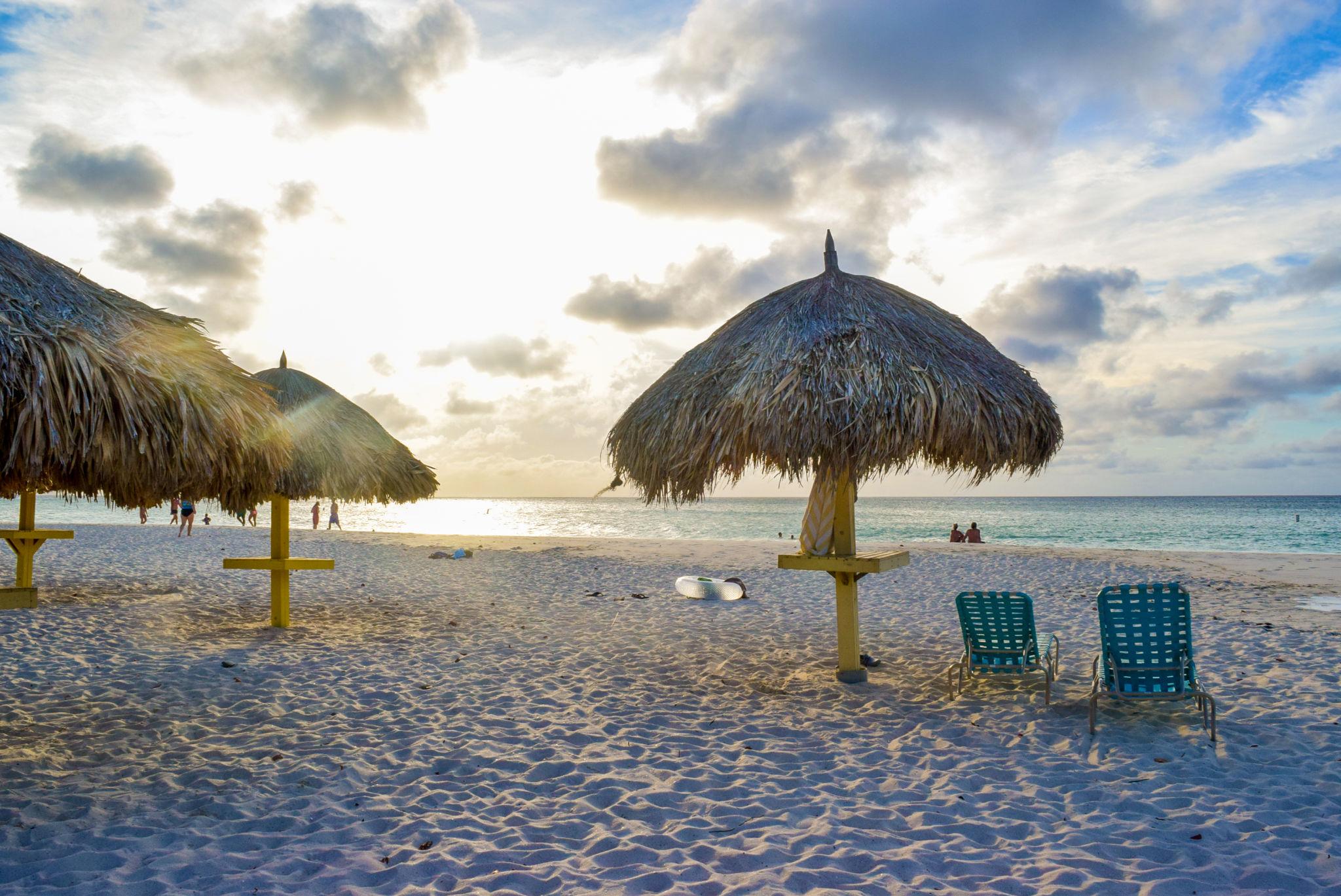 Relaxing under palapas on Eagle Beach, Aruba.