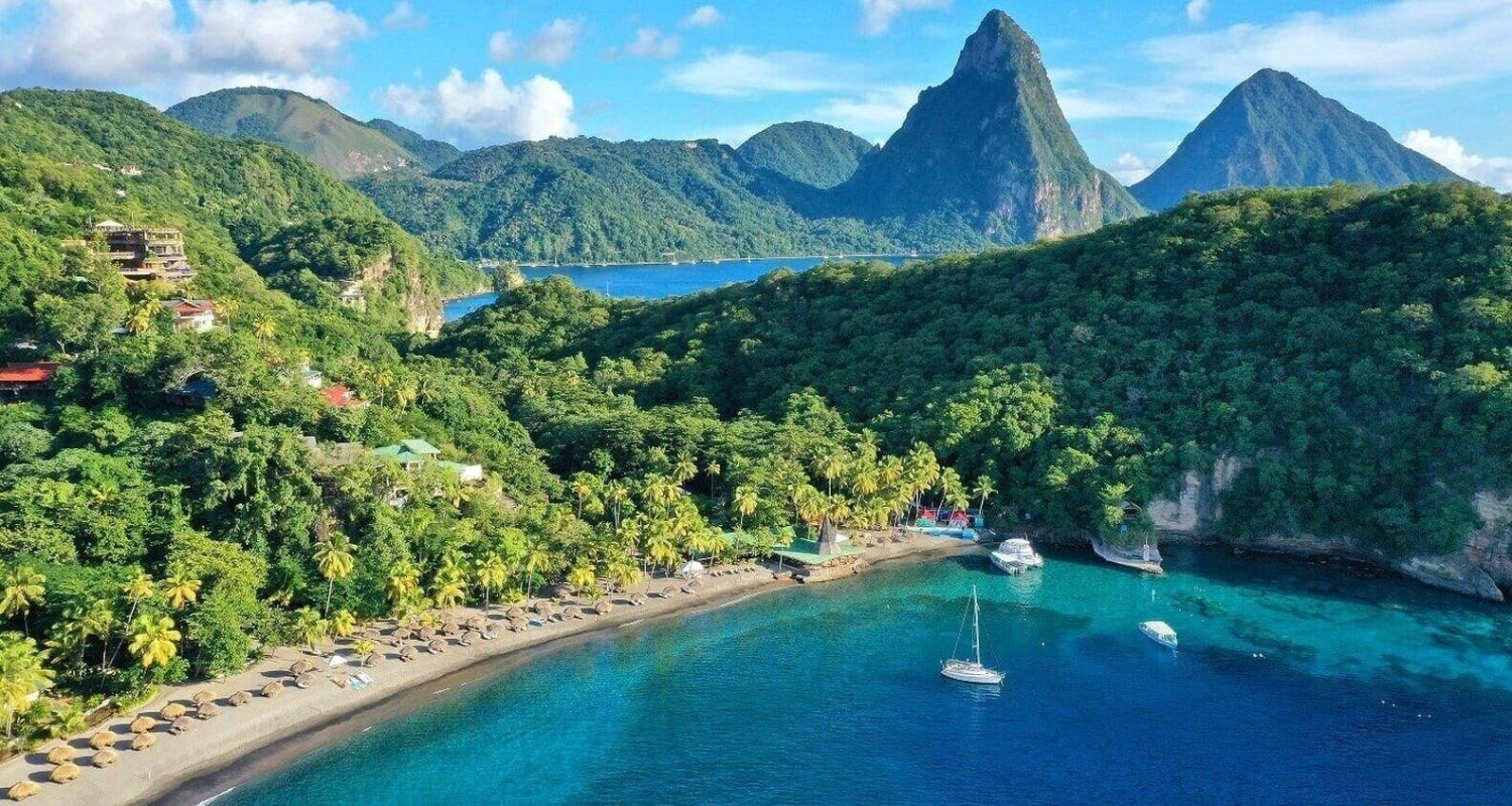 Anse Chastanet Beach is a premier public beach and marine reserve located north of Soufrière in southwestern St. Lucia and is famous for its dramatic black and silver volcanic sand and shore snorkeling.