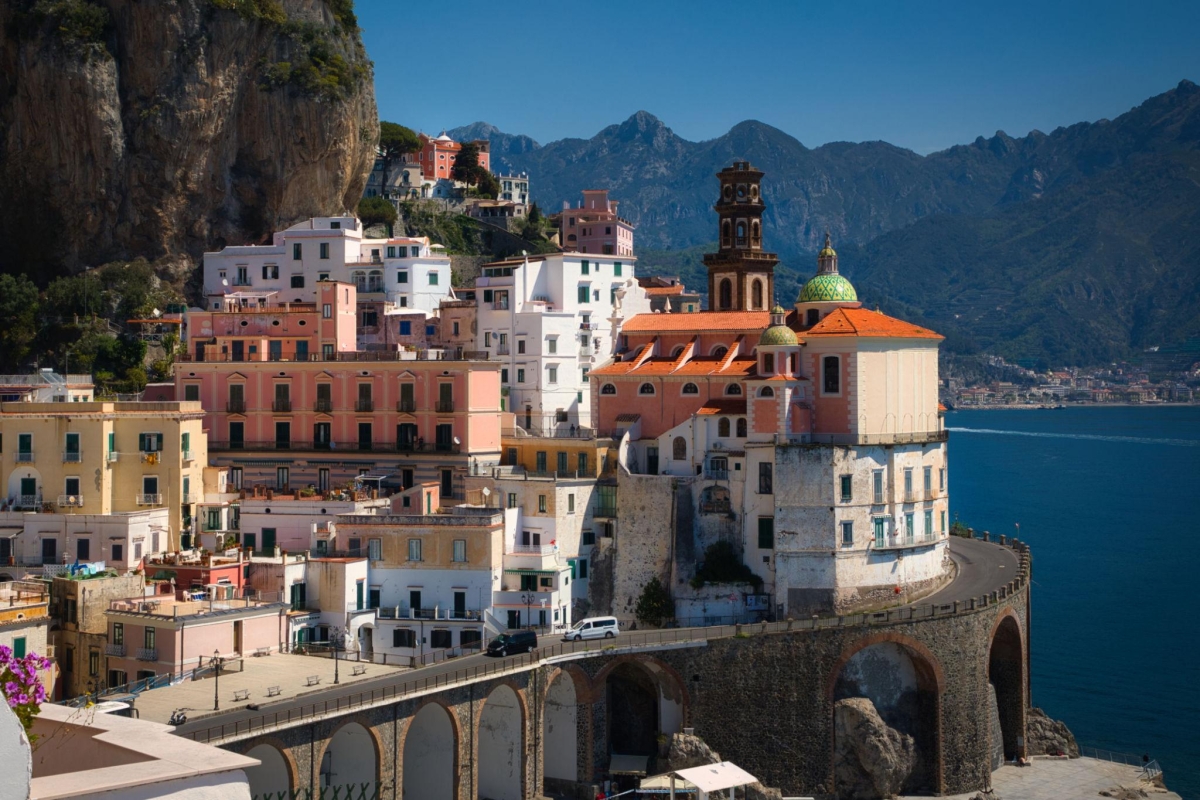 The tiny town of Atrani, known for its narrow alleyways, archways and compact beach is located on the Amalfi Coast in Italy.