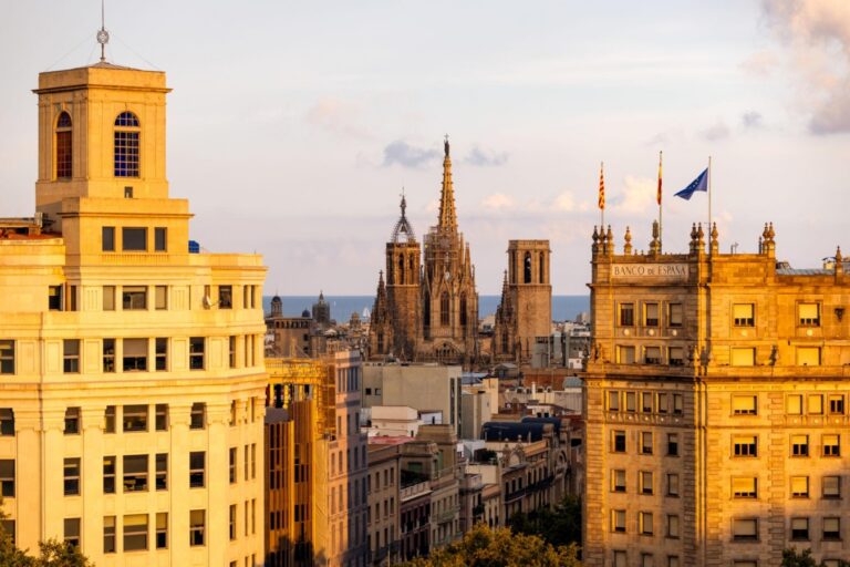 Barcelona skyline at sunset in Catalonia, Spain.
