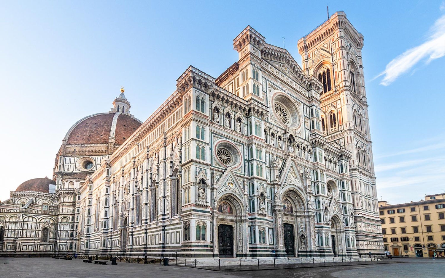 The Cathedral of Santa Maria del Fiore in Florence, Italy ois famous for its striking polychrome marble facade in green, pink and white crowned by Brunelleschi's Duomo.