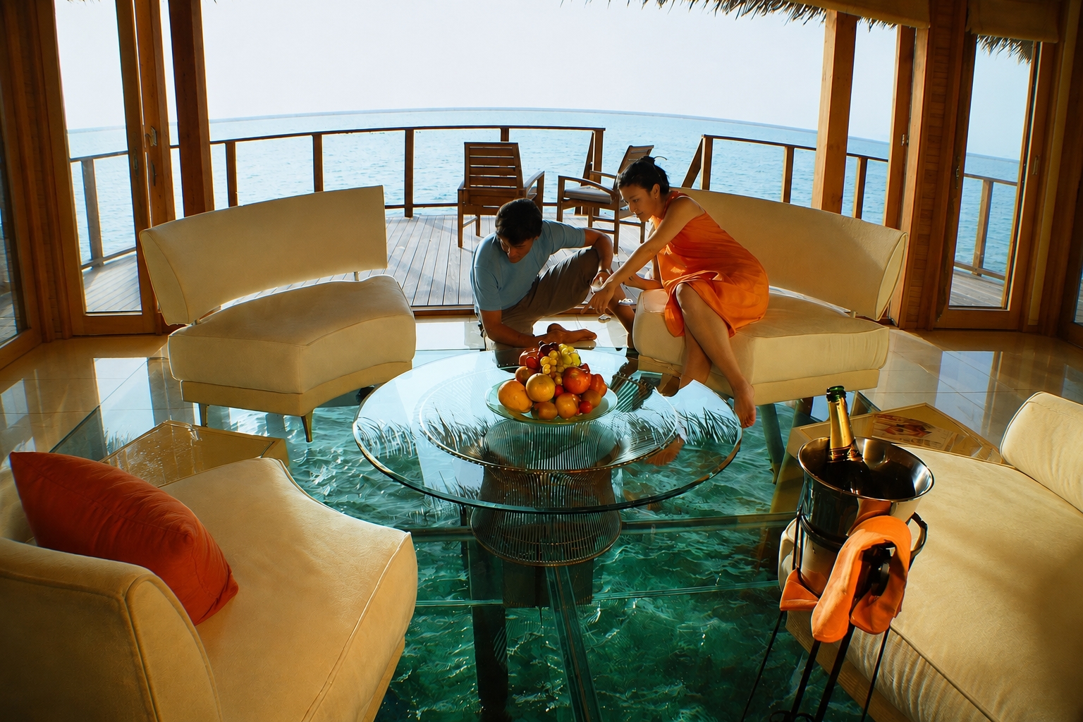 A luxury water villa in the Maldives with a unique glass floor design. (@beautifuldestinations)