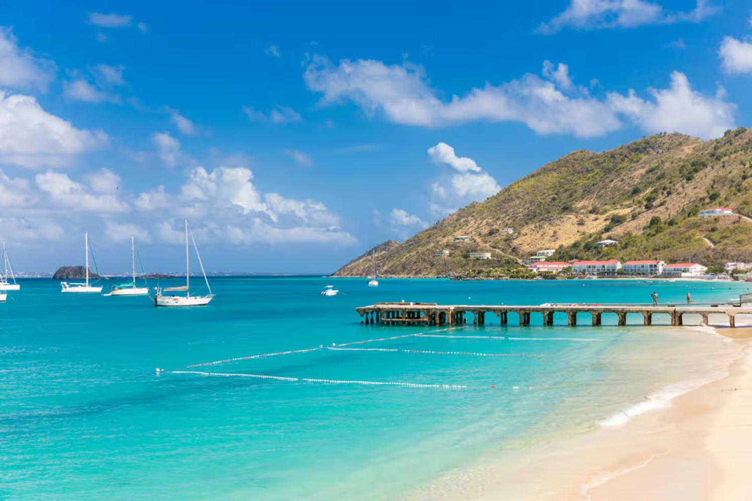 Grand Case is on the French side of Saint Martin, a destination renowned as the Caribbean's gourmet capital known for its shallow turquoise waters, white sand, numerous restaurants, local eateries known as lolos and luxury vacation rentals.