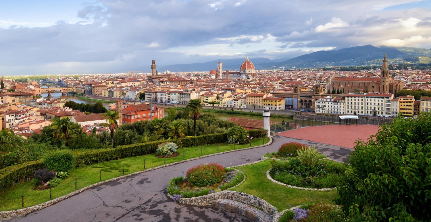 A spectacular view capturing the historic center of Florence from the popular Piazzale Michelangelo, which includes Ponte Vecchio, Florence Cathedral, Palazzo Vecchio and the Basilica di Santa Croce.