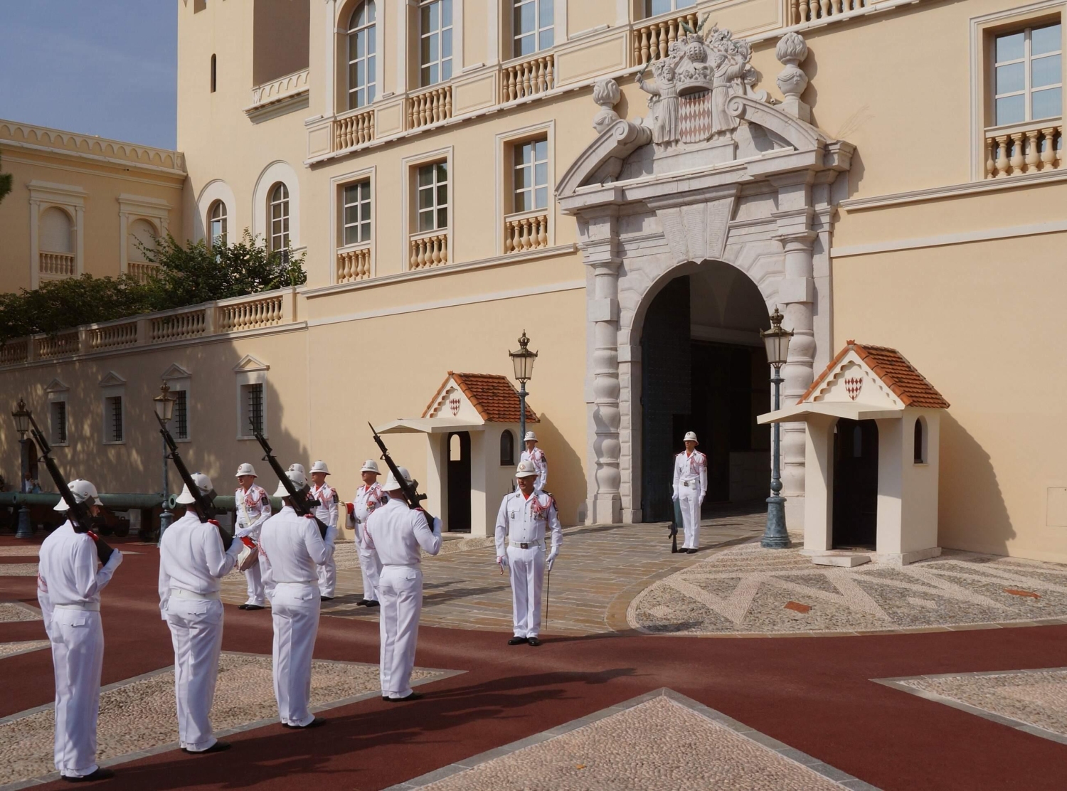 The Prince's Palace of Monaco hosts a daily changing of the guard ceremony in its main courtyard performed by the Compagnie des Carabiniers du Prince at 11:55 am sharp.