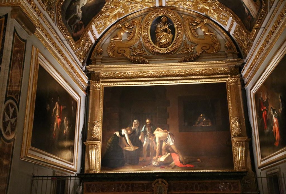 Caravaggio's masterpiece, The Beheading of Saint John the Baptist, displayed in the Oratory of St. John's Co-Cathedral in Valletta, Malta.