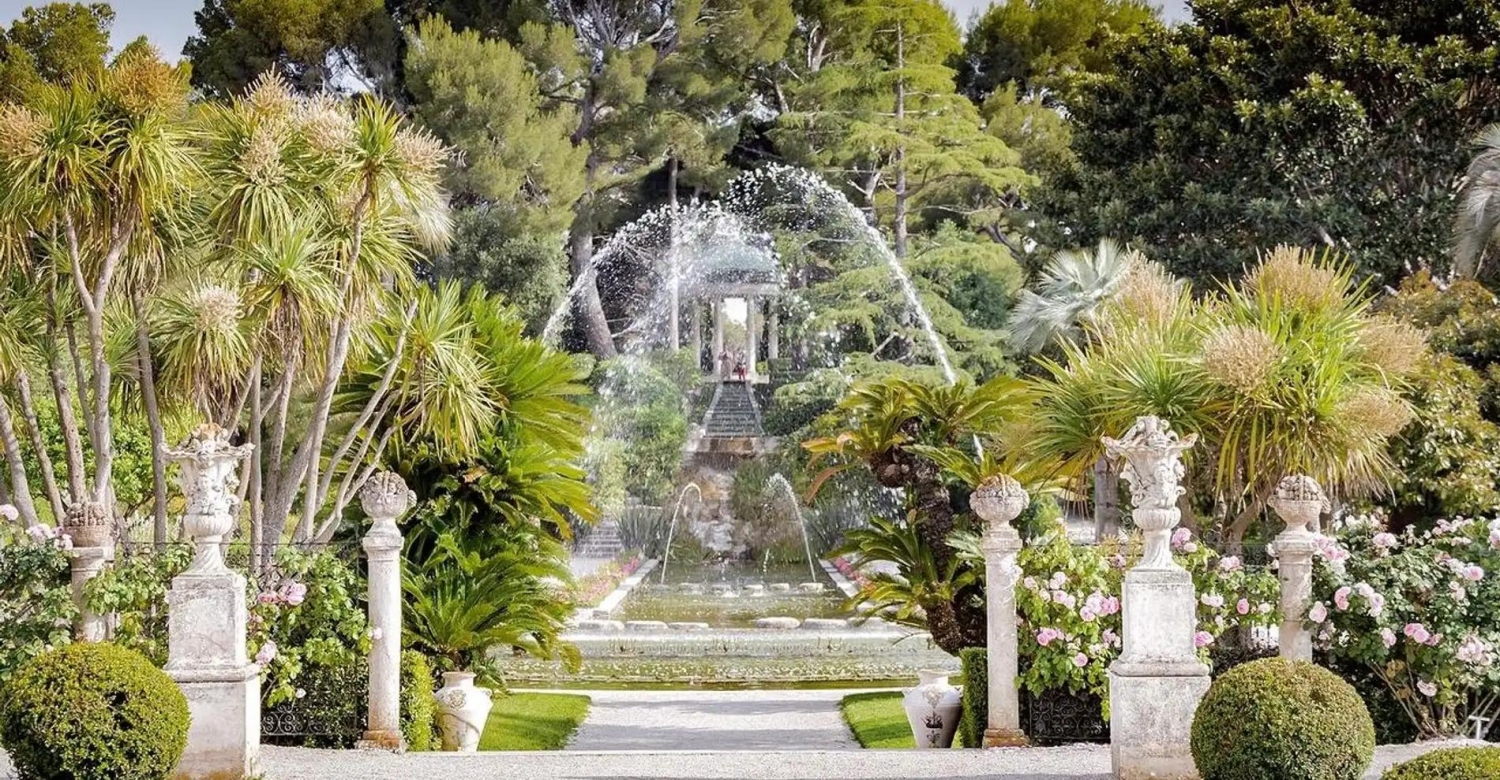 The French Garden at the Villa Ephrussi de Rothschild in Saint-Jean-Cap-Ferrat, featuring musical dancing fountains and a central canal.